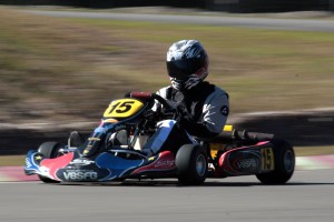 V8 Supercar Fan Group founder Justin Murray in action on the kart track.